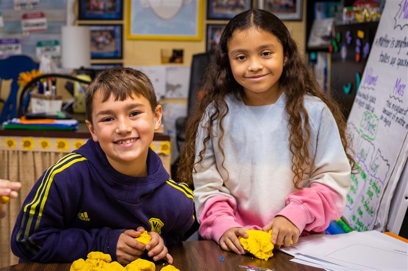 Students make planets out of Play-Doh